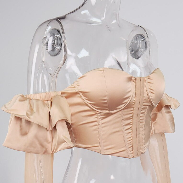 haut beige avec manches bouffantes
